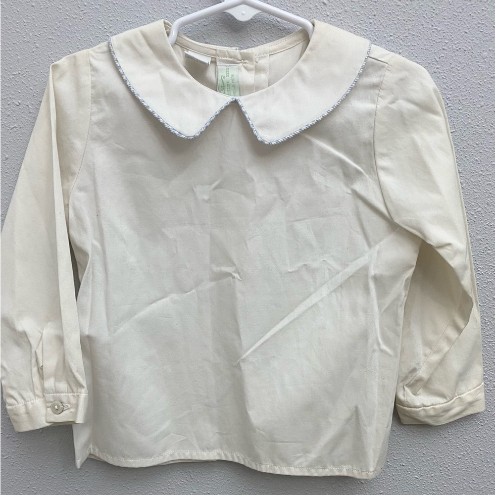 Set of three collared dress shirts.